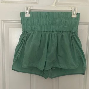 Green exercise shorts